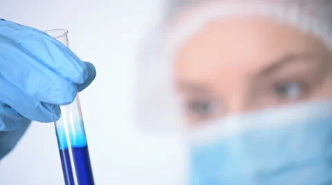Young scientist making chemical test in laboratory Stock Footage 61512446