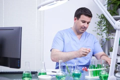 Young scientist man making test in a microbiological research lab 스톡 사진