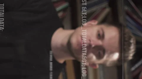 Young scientist or programmer working with program code on transparent screen Video stock 204944830