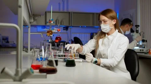 Young scientist smiling at camera Video stock 127561824