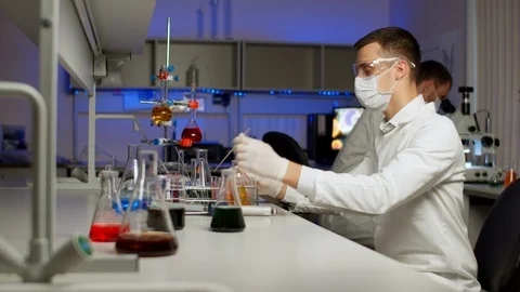 Young scientist smiling at camera Stock Footage 127562322