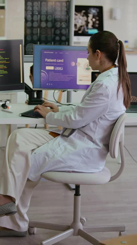 Young Scientist Using AI App while Working on Computer in Smart Lab Stock Footage 332365887