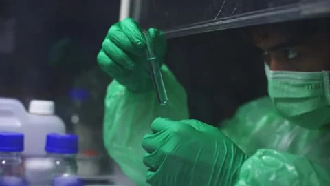 Young scientist using pipette transfer sample to Micro Centrifuge Tube for PCR t Stock Footage 134057893