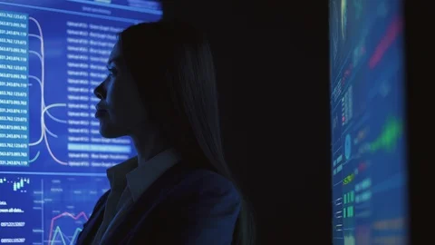 The young scientist working in the dark lab Stock Footage 122537668