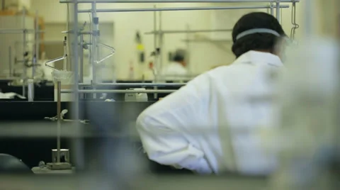 Young scientists in a laboratory Stock Footage 37989188