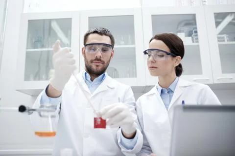 Young scientists making test or research in lab Foto stock