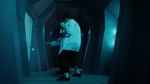 Young scientists in white uniform got infected with a deadly virus Stock Footage 239556926