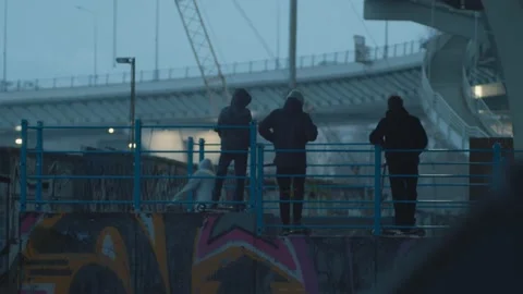 Young scooter riders performing tricks on ramp at skate park. Master Plan male 스톡 동영상 235676158