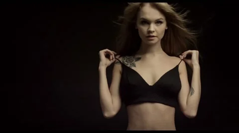 Young seductive woman in black lingerie Stock Footage 59431222