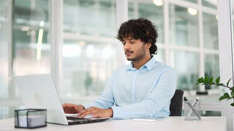 Young serious handsome IT professional programmer working typing coding  Stock Footage 237332909