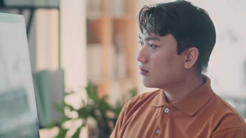 Young Serious Software Engineer Working on Computer Stock Footage 265072012