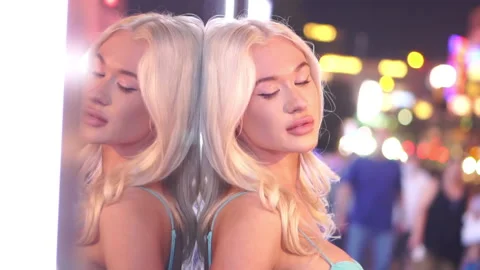 Young Sexy Blonde Las Vegas Woman Posting To Camera on Strip With Reflection Stock Footage