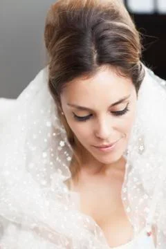 Young sexy romantic latin bride in erotic lingerie smiling Stock Photos