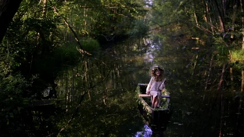 Young sexy woman on boat at sunset. The ... | Stock Video | Pond5