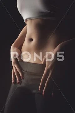 Young sexy woman with long hair demonstrate her black undies Stock Photos