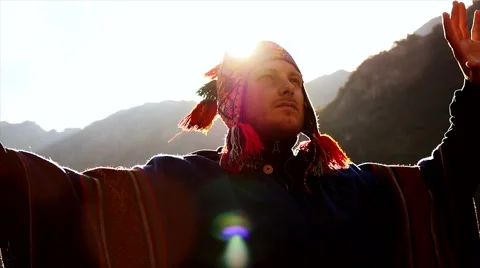 Young shaman man doing mediation recreation activity outdoors at sunset sky Video stock 64802523