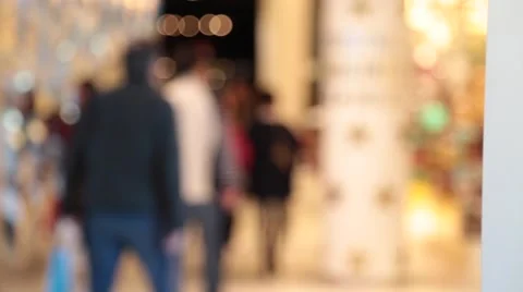 Young  shoppers walking in mall Stock Footage 57787190