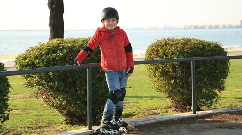 Young skater boy ready to ride on roller skates. 3 Stock Footage 59673146