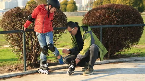 Young skater boy ready to ride on roller skates. 4 Stock Footage 59673469