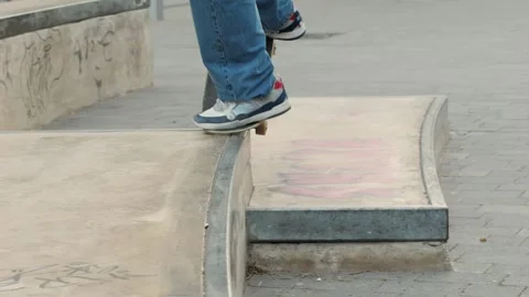 Young skater making 360 flip jump, performing kickflip trick, skateboarder Stock Footage 258375291