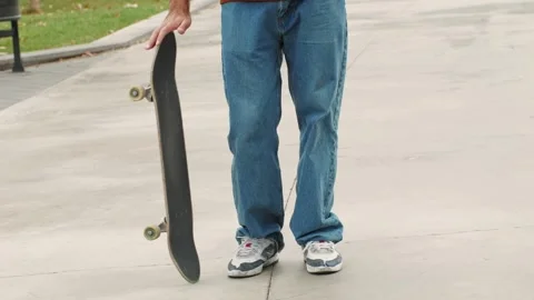 Young skater making 360 flip jump, performing kickflip trick, skateboarder Stock Footage 274085170