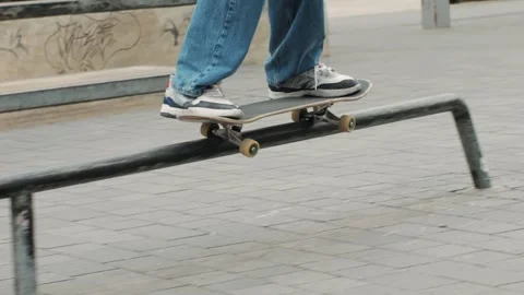 Young skater making 360 flip jump, performing kickflip trick, skateboarder Stock Footage 274085547