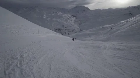 Young Skier man is Carving Down the Snowy Slope Wanderlust Stock Footage 84763868