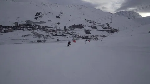 Young Skier man is Carving Down the Snowy Slope Wanderlust Stock Footage 84765871