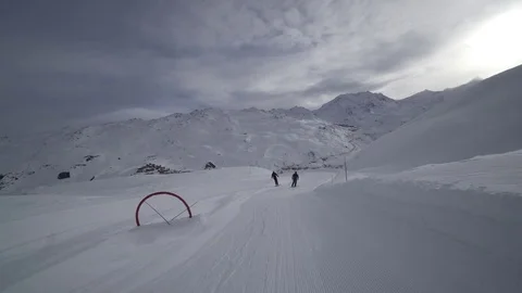 Young Skier man is Carving Down the Snowy Slope Wanderlust Stock Footage 84768671