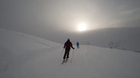 Young Skier man is Carving Down the Snowy Slope Wanderlust Stock Footage 84775590
