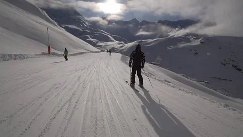 Young Skier man is Carving Down the Snowy Slope Wanderlust Stock Footage 84793330