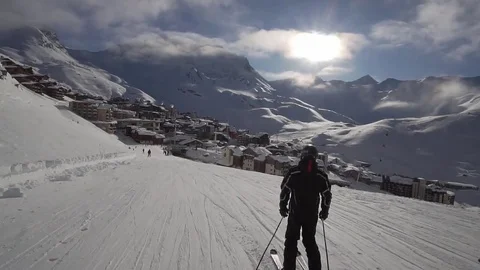 Young Skier man is Carving Down the Snowy Slope Wanderlust Stock Footage 84793716
