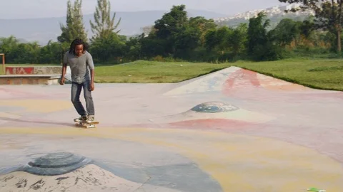 Young skillful skateboarder doing tricks in skate park in slow motion Stock Footage 112985280