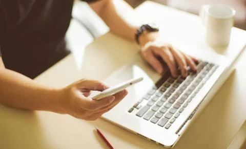 Young sman hand using smart phone,mobile payments online shopping.Seleted foc Stock Photos