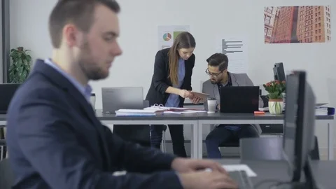 Young smart employee in a jacket working in the office Stock Footage 73992501