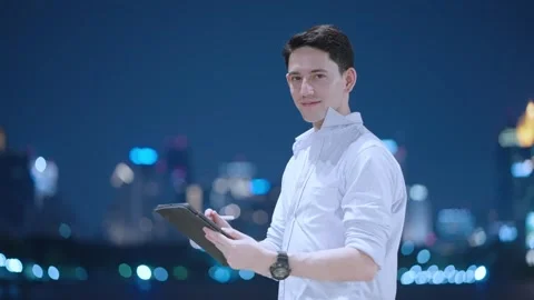 Young smart white man use tablet looking at camera, wireless gadget Stock Footage 276721502