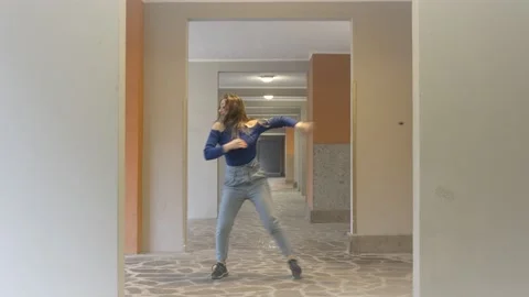 Young smiling ballerina performs a synchronized dance in front of the camera Stock Footage 152788083