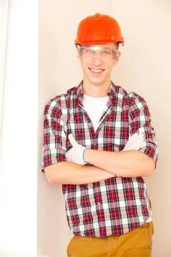 Young smiling construction worker Stock Photos