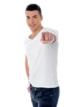 Young smiling guy pointing you out Stock Photos