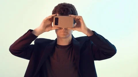 Young smiling man plays virtual reality games Stock Footage 63187505