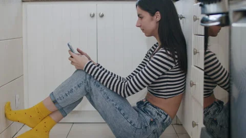 Young Smiling Woman Using Mobile Phone At Home. Stock Footage 220726549
