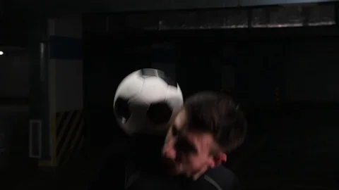 A young soccer man rolling the ball on his shoulders Stock Footage 105562136