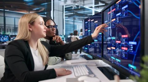 Young Software Developer Teaches Women To Build Apps Using Visual Tools. Stock Photos