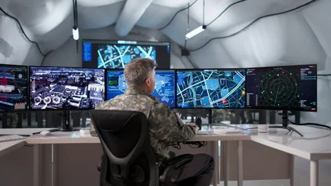 Young Soldier In Field Command Center Using Desktop Computer Stock Footage 328716362