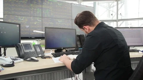 A young specialist at the remote control of wind generators Video stock 73467578