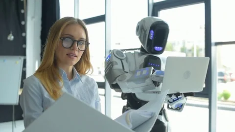 Young specialist working with robot in office Stock Footage 81046219