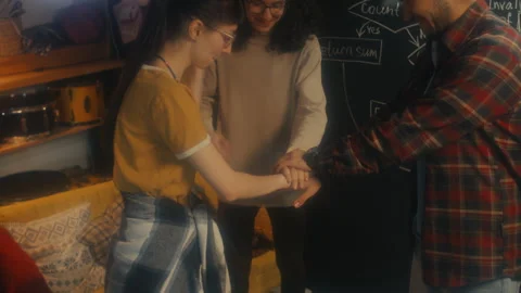 Young Specialists Joining Hands Stock Footage 244950563