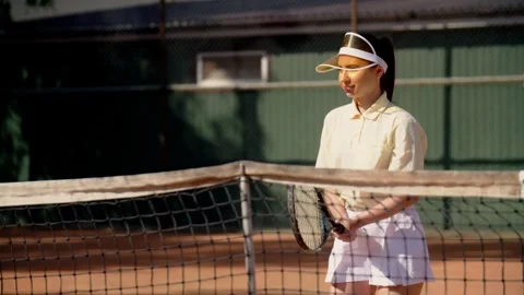 A young sportswoman develops the technique of repelling an opponent hits on Video stock 256023658