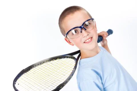 Young squash player with protective glasses and squash racket Stock Photos