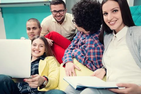 Young start up team disccusing projects Stock Photos